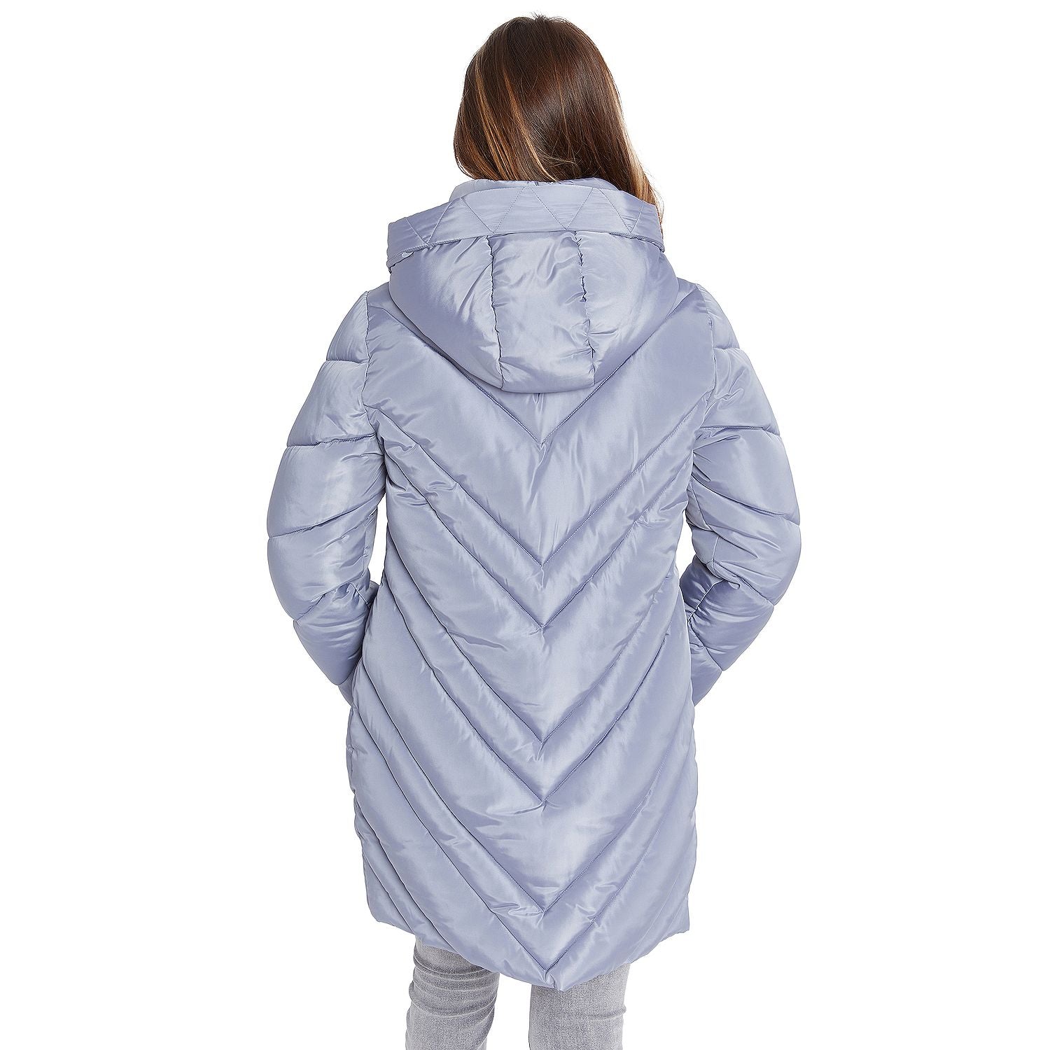 A woman viewed from the back wearing a light lavender hooded puffer jacket with a chevron quilted pattern, set against a plain white background.