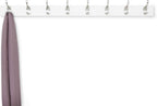 White wall-mounted coat rack with hooks and a purple scarf on a white background