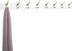 White wall-mounted coat rack with hooks holding a purple scarf on a white background