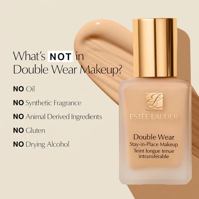 Estée Lauder Double Wear foundation bottle with ingredients list on a beige background