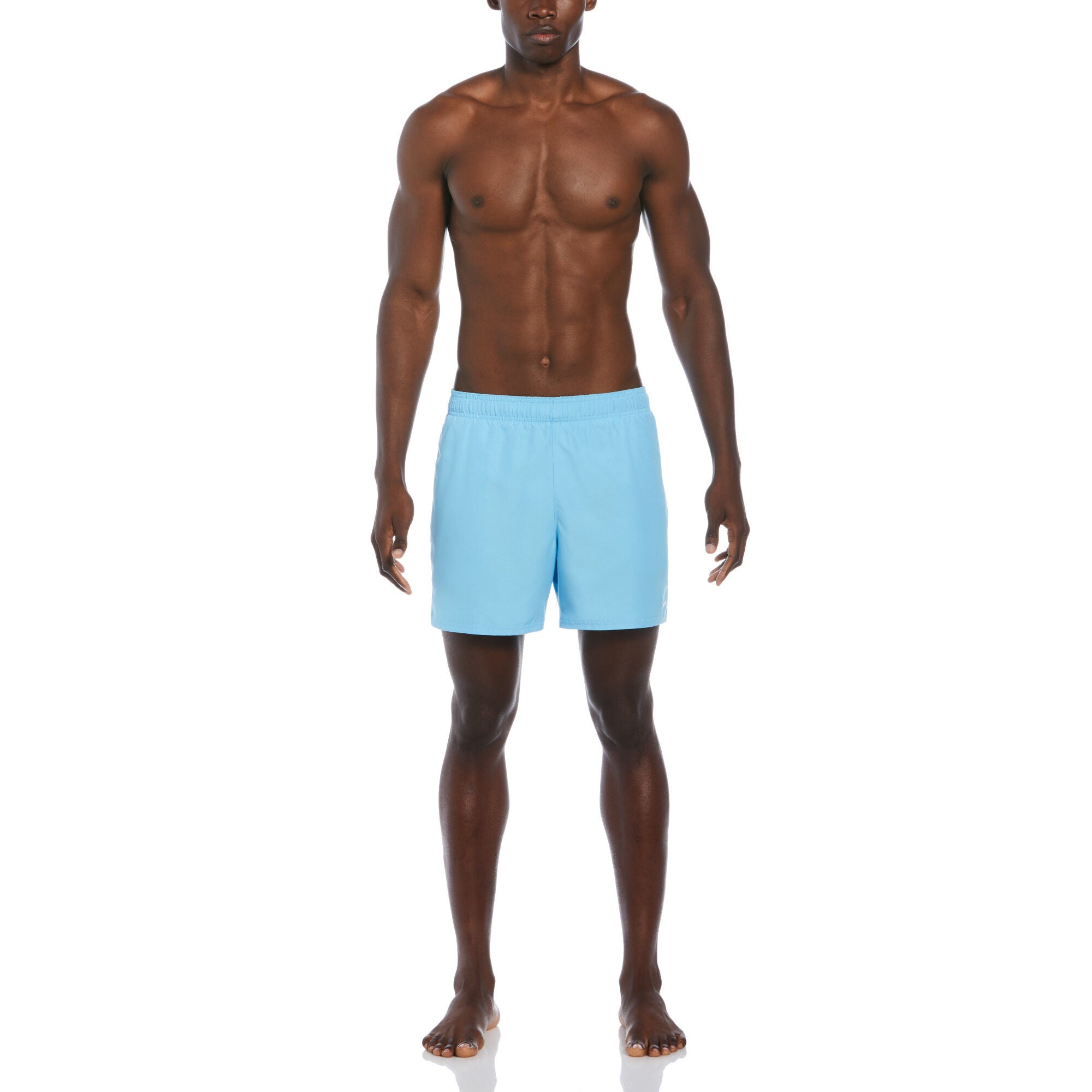 Man wearing light blue swim shorts on a white background