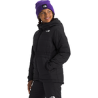 A model wearing a black puffer jacket and matching black pants by The North Face, paired with a purple beanie, against a solid white background.