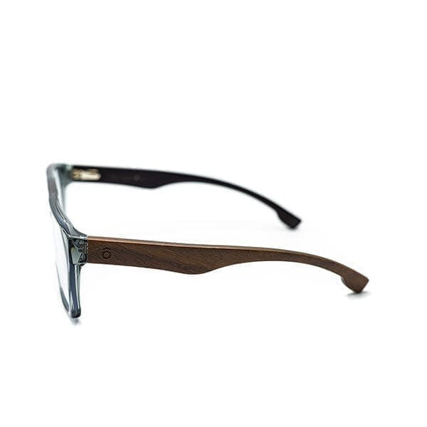 A pair of eyeglasses with a translucent smoky gray acetate frame and dark brown wood temples, shown from a side profile on a white background.